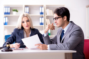 Lawyer discussing legal case with client