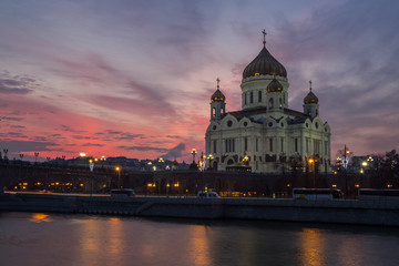 Fototapeta na wymiar Embankment of Moscow River near the Cathedral of Christ the Savior at sunset. Moscow, Russia.