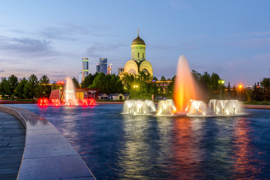 Fountains on Poklonnaya hill in victory Park. Church of St. George the victorious on Poklonnaya hill . Moscow. Russia.
