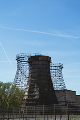 Three old wooden and steel cooling tower