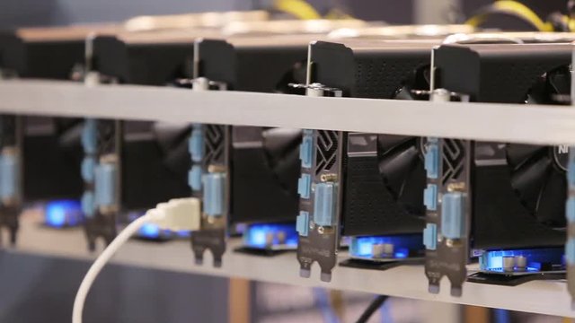 Cryptocurrency mining equipment rig - lots of gpu cards on mainboard
