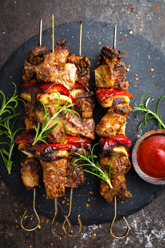 Grilled meat skewers, shish kebab with onion and sweet pepper
