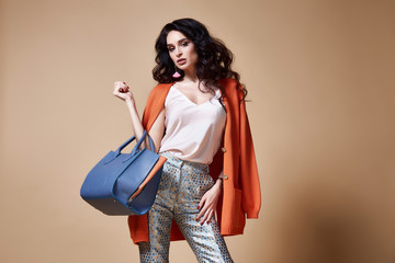 Sexy beautiful woman fashion glamour model brunette hair makeup wear pants clothes for every day...