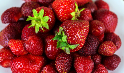 ripe berry strawberry clouse-up for the background.