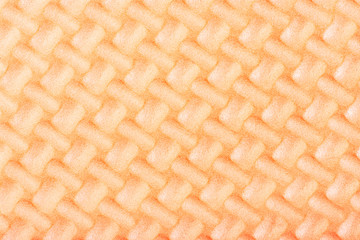 Peach colored textured ethylene vinyl acetate closeup