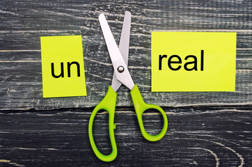 unreal concept , I can, goal achievement, potential, overcoming. scissors cut the word 