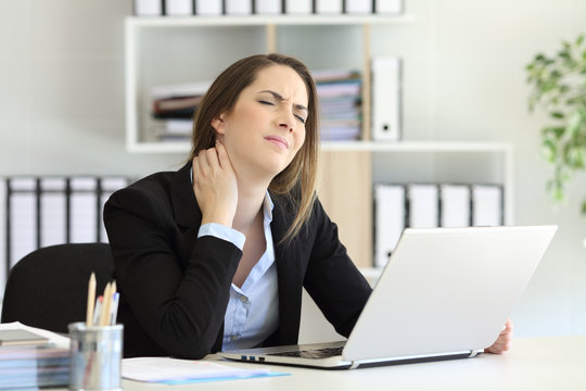 Office worker suffering neck ache