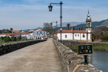 Fototapeta na wymiar Bridge crossing the Rio Lima