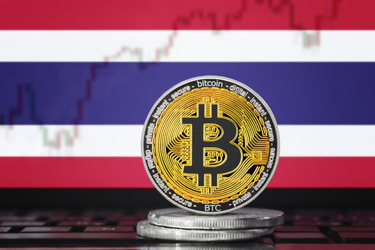 BITCOIN (BTC) cryptocurrency; coin bitcoin on the background of the flag of Thailand