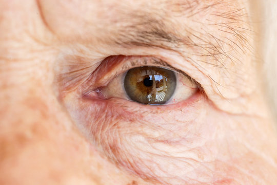 
Close-up image of old woman's eye, looking at camera