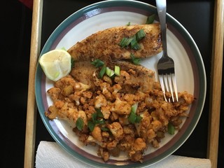 Delicious chicken thighs with curry and coconut sauce.