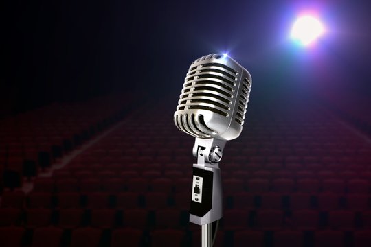 Retro Microphone On Stage Under Spotlight