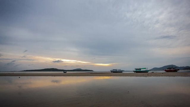 4-K time lapse of longtail fishing boats in phuket thailand
