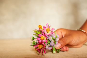 Asian Girl Hold Mini Flower Bouquet