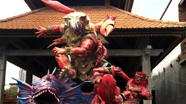 close up of a crustacean like ogoh-ogoh statue on the streets of kuta in bali, indonesia