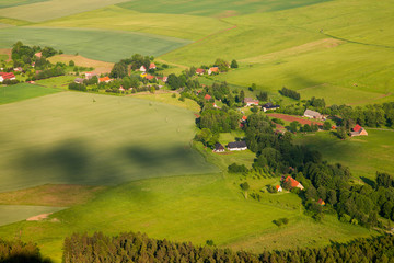 Aerial view of farmland and villages in the Czech countryside of northern Bohemia