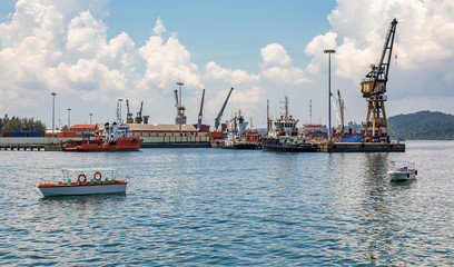 Port harbor industrial area at Port Blair, Andaman India with view of cranes and shipping vessels