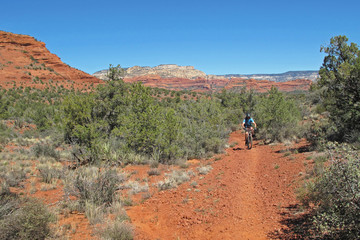 Mountain biker in the red rocks, Sedona, Arizona, USA