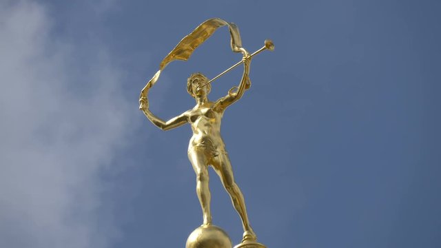 Low angle of a woman golden statue