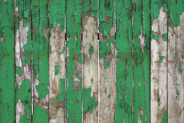 Old Weathered Natural Wooden Background Fence Fragment Texture. Rustic Wooden Debarked Texture Green painting. Banner.