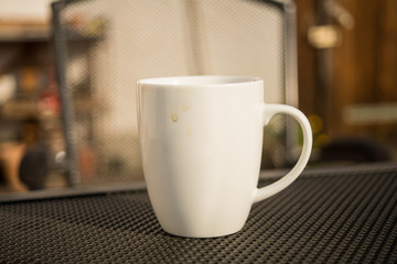 Cup of coffee standing on a table