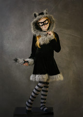 Little Girl in Racoon Costume