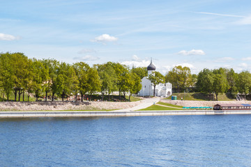 Fototapeta na wymiar Church of St. George the Victorious on the banks of the Great River in Pskov