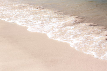 waves at  white sand.