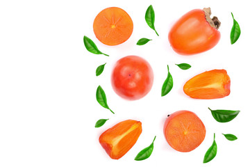 persimmon decorated with leaves isolated on white background with copy space for your text. Top view. Flat lay pattern