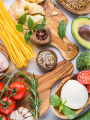 Variety of popular Italian food on white background. Top view.