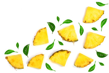 Sliced pineapple decorated with green leaves isolated on white background with copy space for your text. Top view