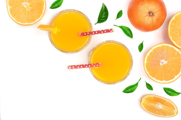 orange juice glass with slices of citrus and leaves isolated on white background with copy space for your text, top view