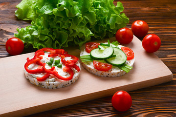 Rice wafers, cheese and cucumbers sandwiches. 