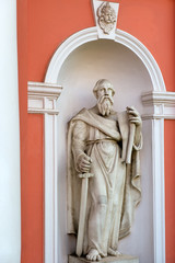 Fototapeta na wymiar RUSSIA, SAINT PETERSBURG - AUGUST 18, 2017: Statue of St. Paul in the niche of the bell tower (1812) of Holy Cross Cossack Petersburg