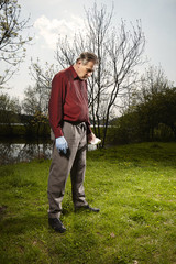 Man looking for falling meteorite made happy find on spring meadow