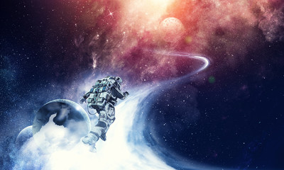 Running spaceman and galaxy. Mixed media