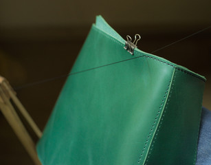 handmade green leather bag sewing man oldschool