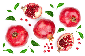 pomegranate with leaves isolated on white background. Top view. Flat lay pattern