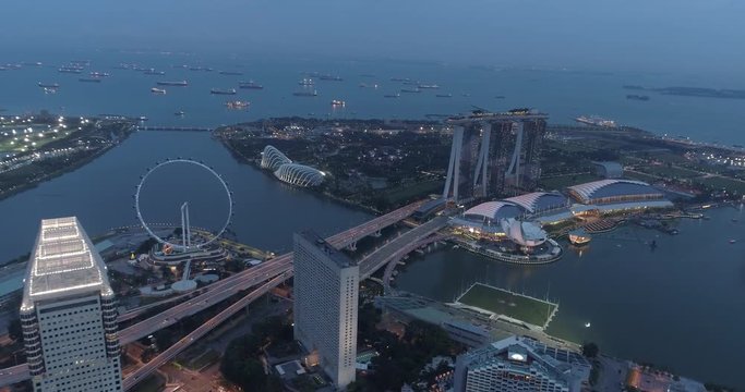 Aerial drone view of Singapore Marina Bay during cloudy evening, Singapore
