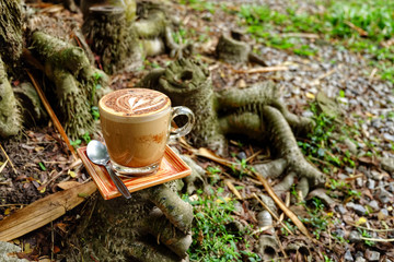 Mocha coffee mug. Mocha coffee cup put on Bamboo stump.
