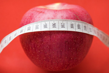 Apple with White Measuring Tape © Supertrooper