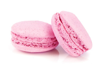 pink macaron isolated on white background closeup