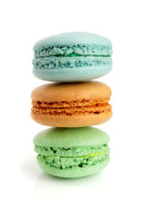 colorful macarons isolated on white background closeup