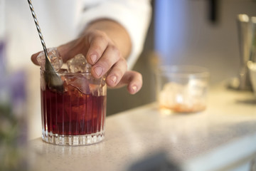 making americano in a bar