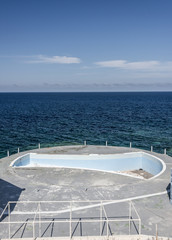Fototapeta na wymiar derelictb swimming pool complex and lido, malta