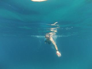 Fototapeta na wymiar Tourist underwater. Red Sea. Jordan