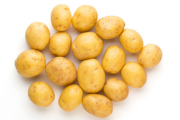 New potato and rosemarin isolated on white background close up.