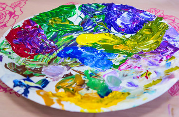 Colorful palette on the white plate