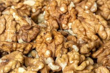 Peeled walnuts background