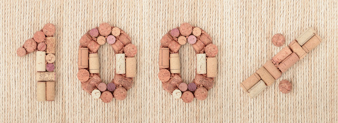 Number hundred 100 %  percent made of wine corks on sea twine background. Sale Banner